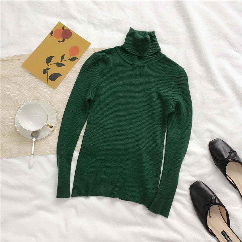 Deep green ribbed knit turtleneck sweater