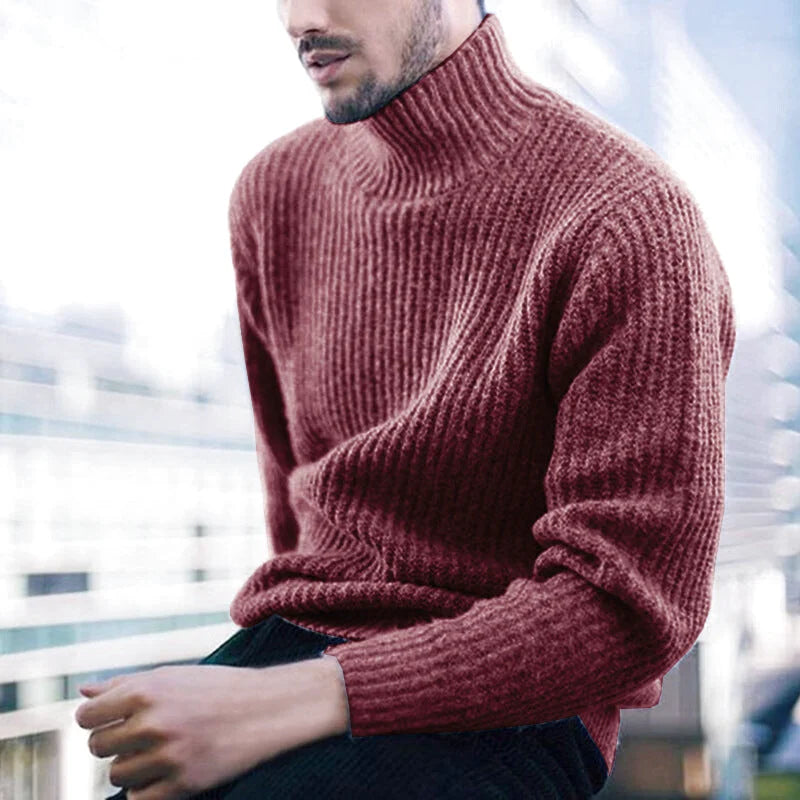 A rich burgundy ribbed knit turtleneck sweater with a textured, cozy appearance