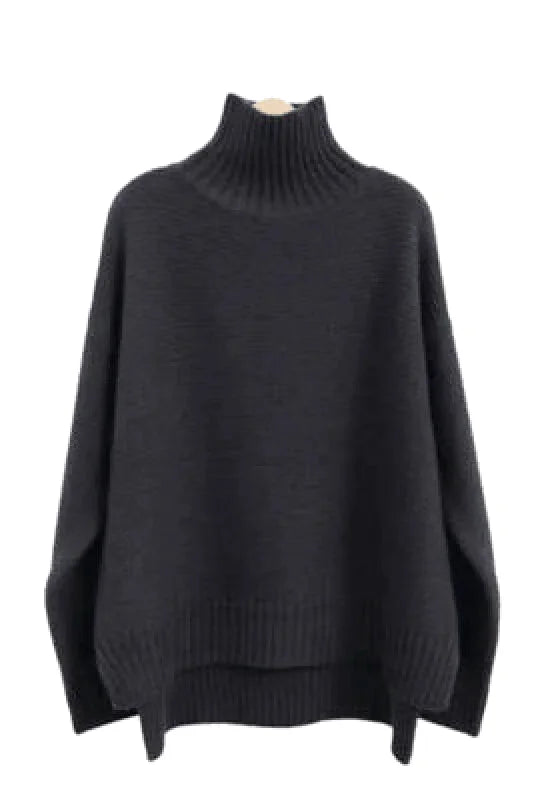 Black, oversized turtleneck sweater with ribbed detailing at the neckline and cuffs