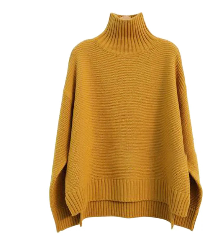 A cozy mustard-yellow ribbed knit turtleneck sweater with wide, flowing sleeves and a slightly asymmetrical hem