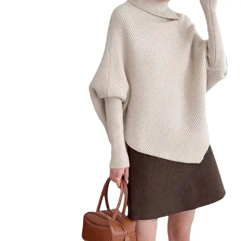 Beige ribbed knit turtleneck sweater with voluminous sleeves