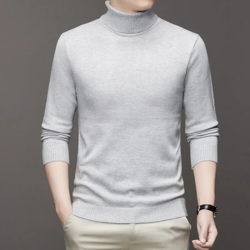 Light gray turtleneck sweater with ribbed cuffs and hem