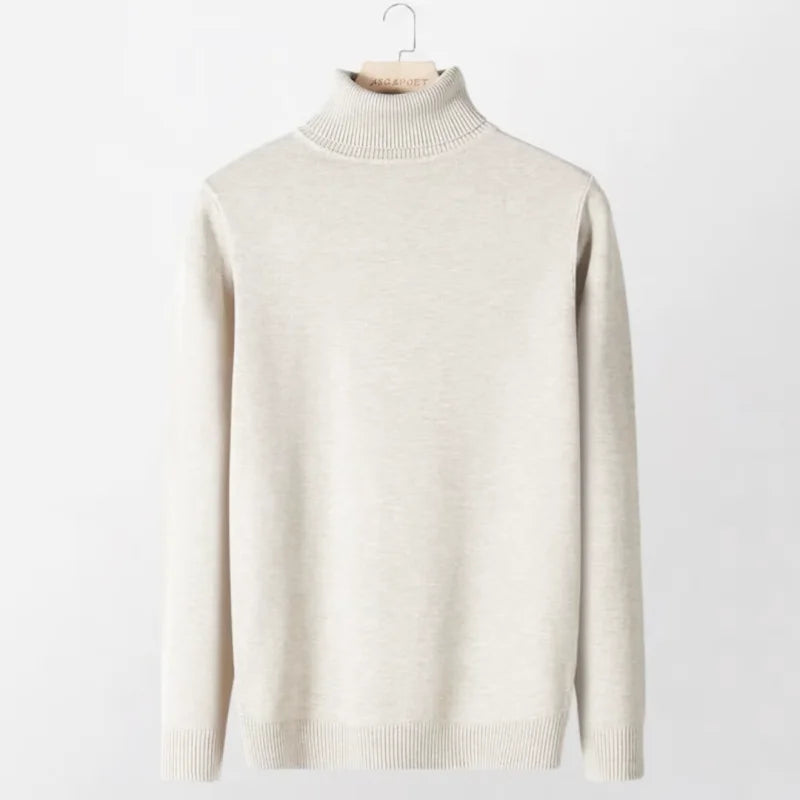 Cream-colored, long-sleeved turtleneck sweater with a ribbed knit collar and cuffs