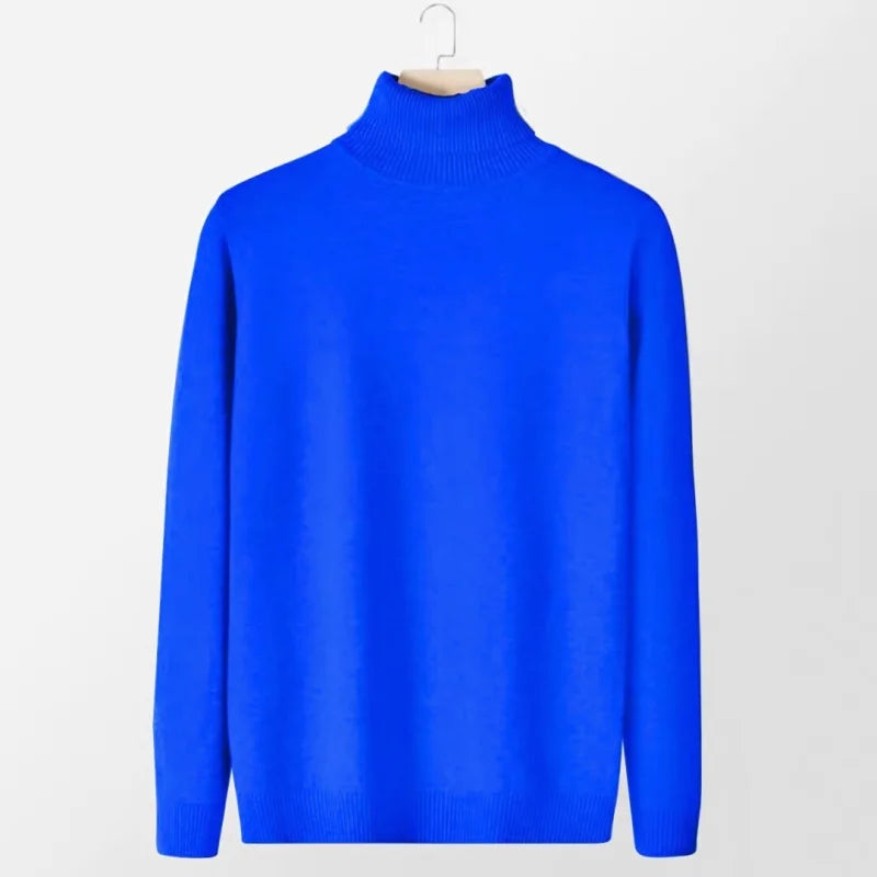 Vibrant royal blue turtleneck sweater with a smooth knit texture and ribbed cuffs