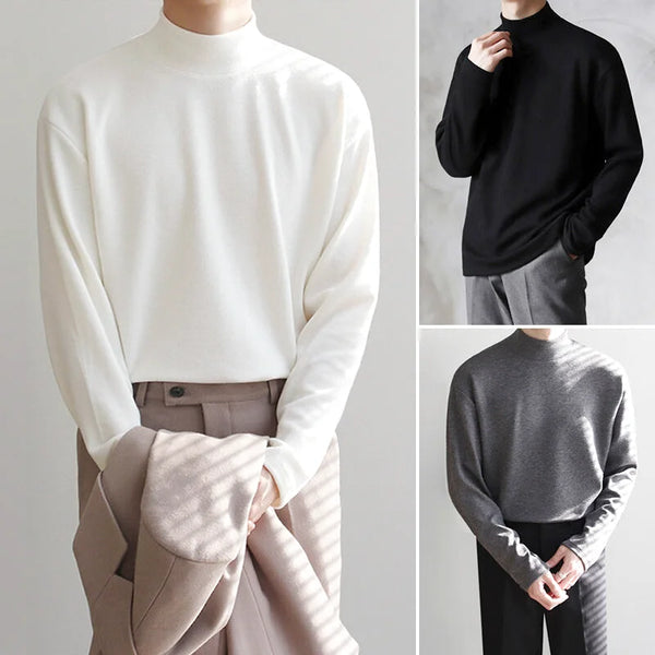 A soft, long-sleeved turtleneck sweater in white, black, or gray