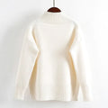 Cream-colored, ribbed-knit turtleneck sweater with long sleeves and a soft, cozy texture