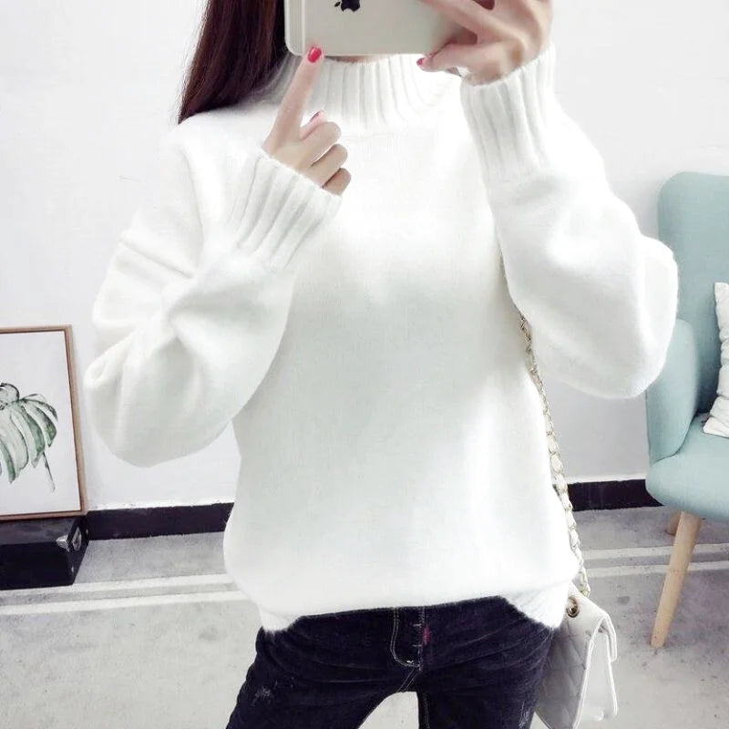 White fluffy knit sweater with ribbed cuffs and neckline