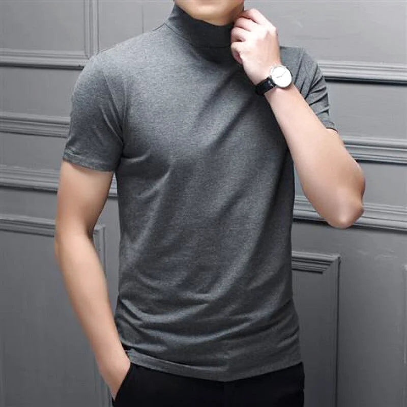 A sleek, dark gray short-sleeved turtleneck shirt made of smooth, form-fitting fabric