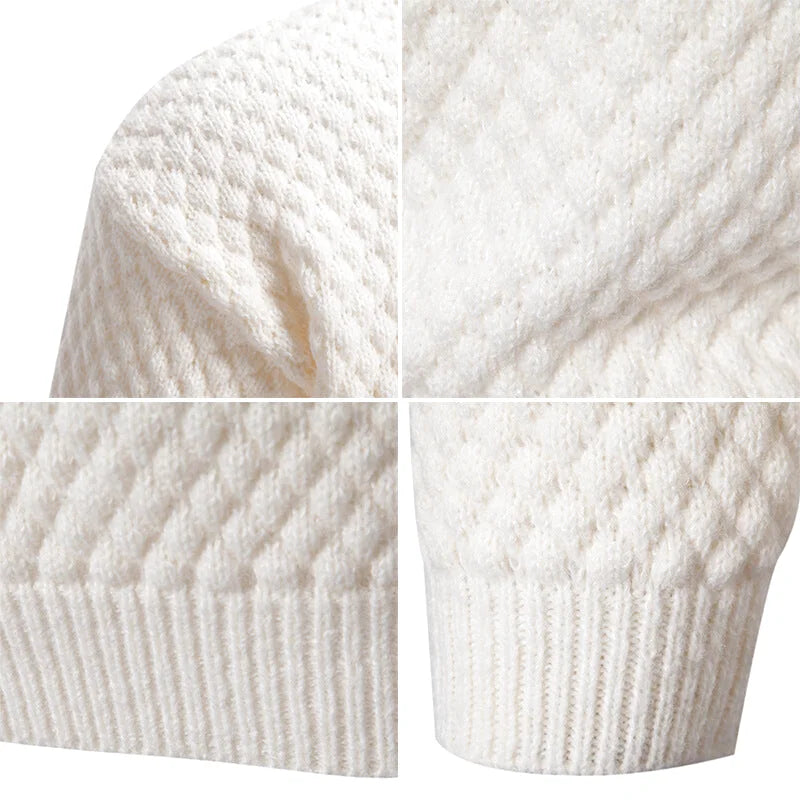 White knitted sweater with a textured, diamond-patterned knit and ribbed cuffs