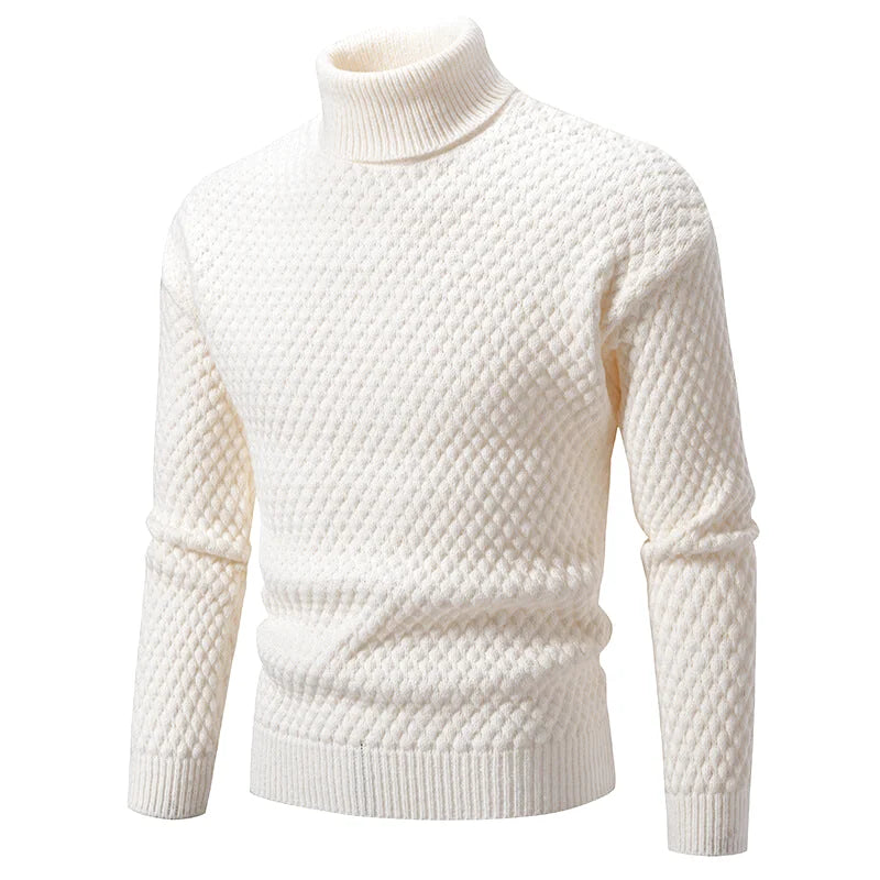 Cream-colored turtleneck sweater with a textured, diamond-patterned knit design