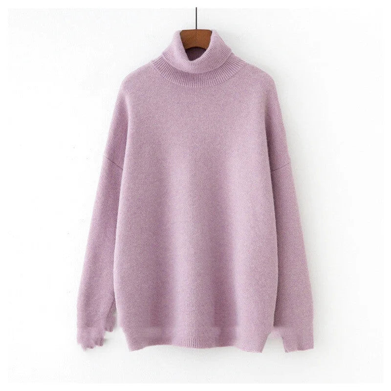 A soft lavender turtleneck sweater with a cozy, textured knit and relaxed fit