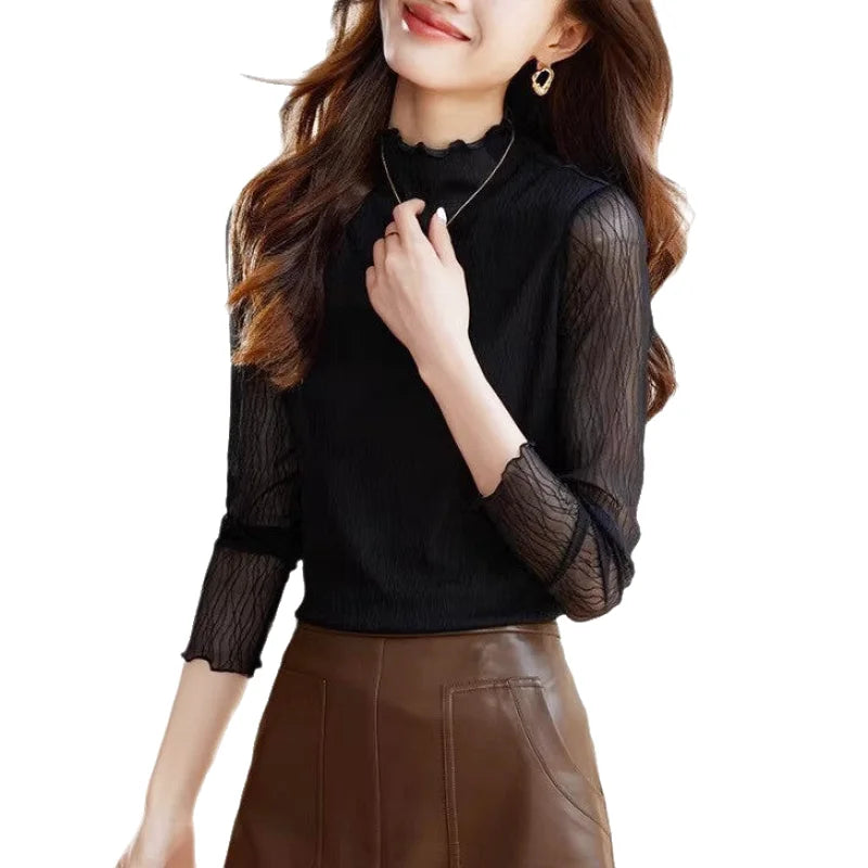 Black sheer lace long-sleeved top with a high neckline and ruffled hem