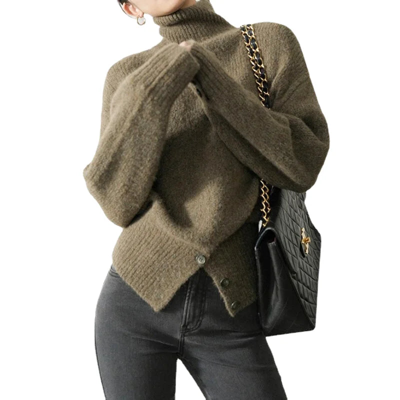 Olive green, oversized turtleneck sweater with a soft knit texture and button closure