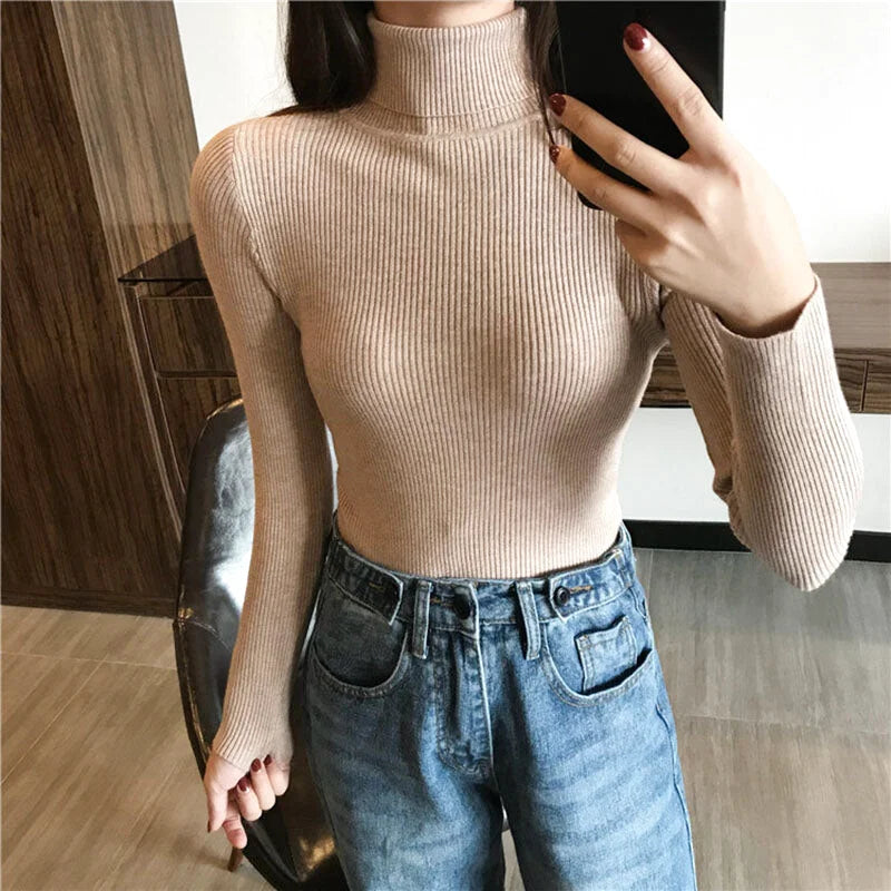 Beige ribbed knit turtleneck top with long sleeves