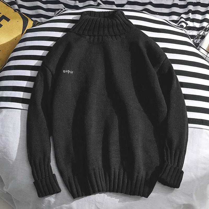 Black ribbed turtleneck sweater with subtle ’super’ embroidery on the left chest