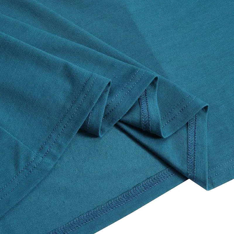 Teal-colored cotton t-shirt with neatly stitched seams